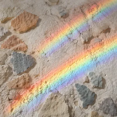 Prism Rainbow Light on Textured White Wall