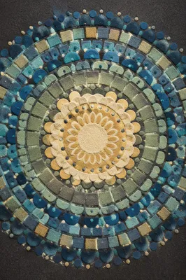 Intricate Sand Art Mandala in Blue Tones