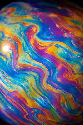 Iridescent Soap Bubble Macro Swirl Background