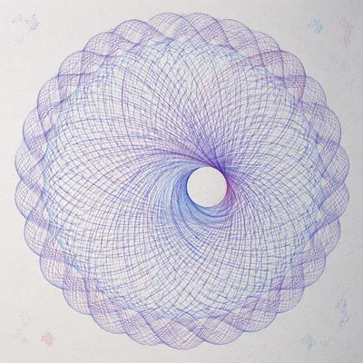 Colorful Spirograph Rosette on White Paper