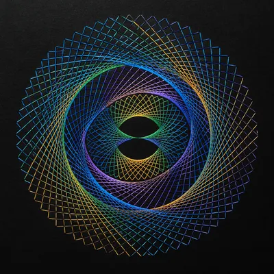 Colorful Spirograph Vortex on Black Paper