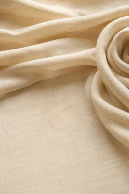 Warm Beige Draped Fabric Background