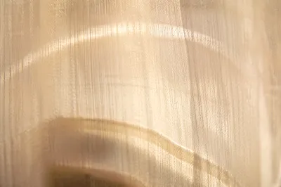 Warm Beige Sheer Fabric Background