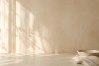 Warm Beige Limewash Background with Cream Table