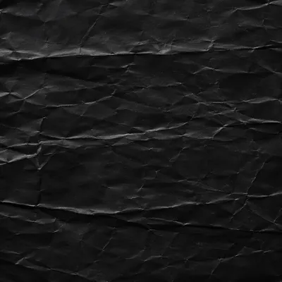 Matte Black Crumpled Paper Texture Background