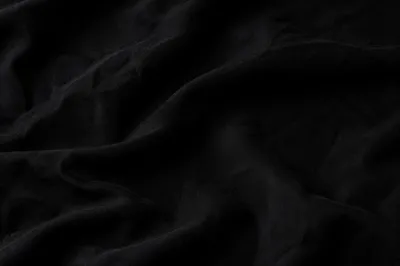 Dark Black Fabric Background with Soft Folds