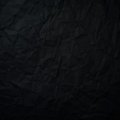Matte Black Crumpled Paper Background