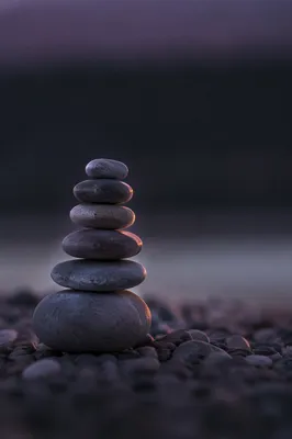 Balanced River Stones on Dark Background