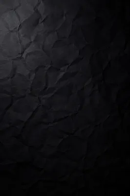 Matte Black Crumpled Paper Background