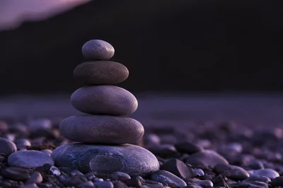 Twilight Cairn on Dark Pebble Shore