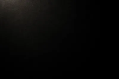 Dark Matte Black Textured Background