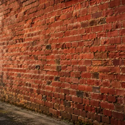 Weathered Red Brick Wall Background