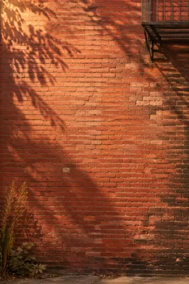 Weathered Red Brick Urban Wall Background