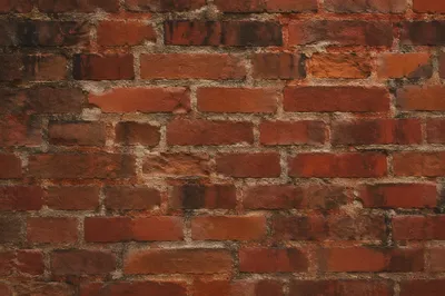 Weathered Red Brick Wall Texture Background