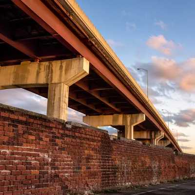 Weathered Red Brick Urban Bridge Background
