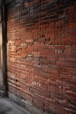 Weathered Red Brick Urban Wall Background