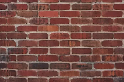 Weathered Red Brick Urban Wall Background