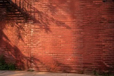 Weathered Red Brick Wall Background