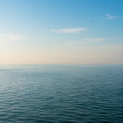 Calm Ocean Horizon Blue Gradient Background