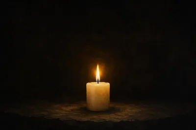 Single White Candle on Dark Background