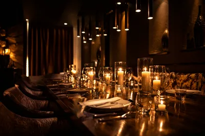 Warm Candlelit Private Dining Table
