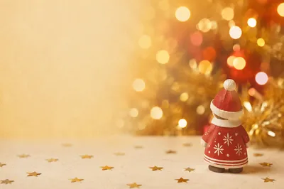 Red Holiday Ornament with Golden Bokeh