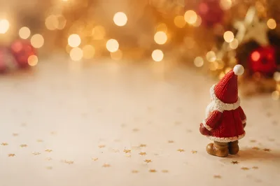 Red Holiday Ornament with Golden Bokeh