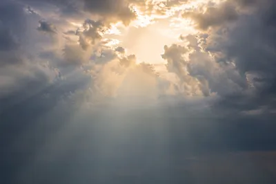 Dramatic Cloudy Sky with Sunlight Break
