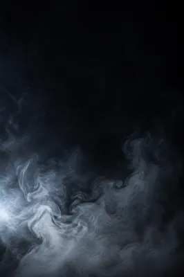 Drifting White Smoke on Dark Background