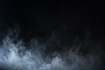 Drifting White Smoke on Dark Background