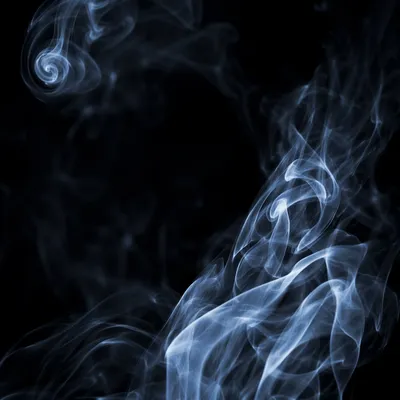 Dramatic Blue Smoke on Dark Background