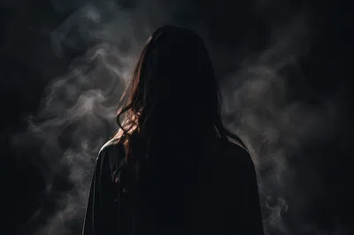 Dramatic Smoky Background With Anonymous Figure