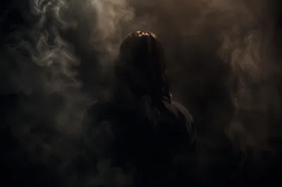 Anonymous Silhouette in Dark Smoky Haze