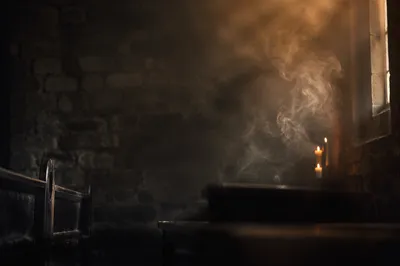 Dark Smoky Sanctuary Background with Candlelight