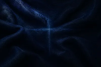 Subtle Cross Glow on Navy Fabric