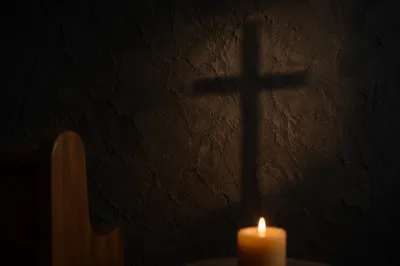 Dark Plaster Chapel Wall with Subtle Cross