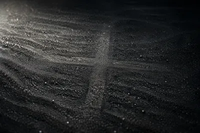 Dark Textured Background with Subtle Cross