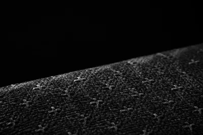 Dark Woven Textile with Subtle Cross Pattern