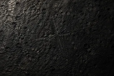 Dark Stone Texture With Subtle Cross