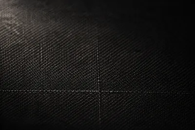 Dark Textured Background with Subtle Cross
