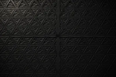 Dark Textured Background with Subtle Cross