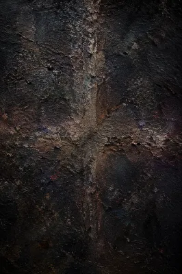 Dark Textured Background with Subtle Cross