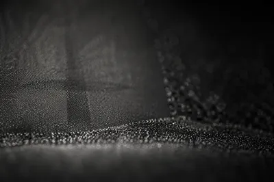 Subtle Cross on Dark Textured Background