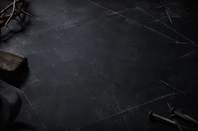 Dark Textured Background with Subtle Cross