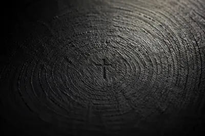 Subtle Cross on Dark Charcoal Texture