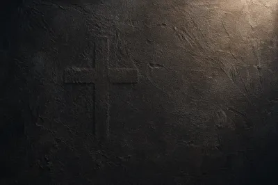 Dark Textured Background with Subtle Cross