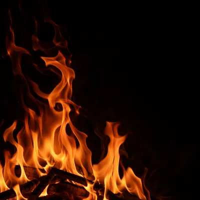 Glowing Orange Flames on Dark Background