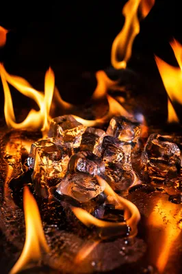 Dramatic Flames Around Melting Ice Cubes