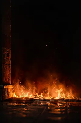 Dramatic Flames in Dark Stone Interior
