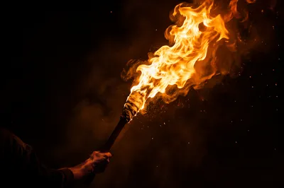 Dramatic Torch Flame on Dark Night